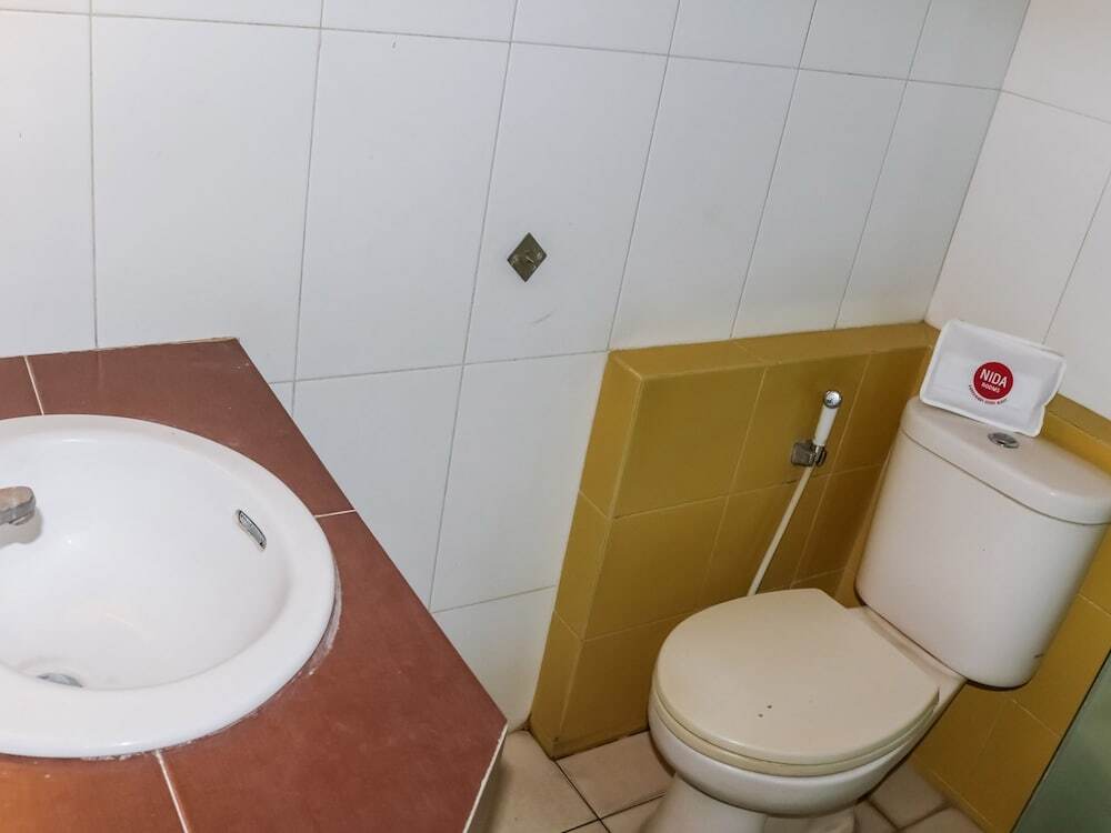 Петумбак: Nida Rooms Pasar Buah Medan Tuntungan