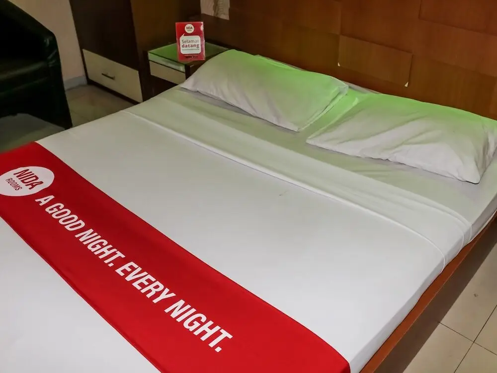 Петумбак: Nida Rooms Pasar Buah Medan Tuntungan