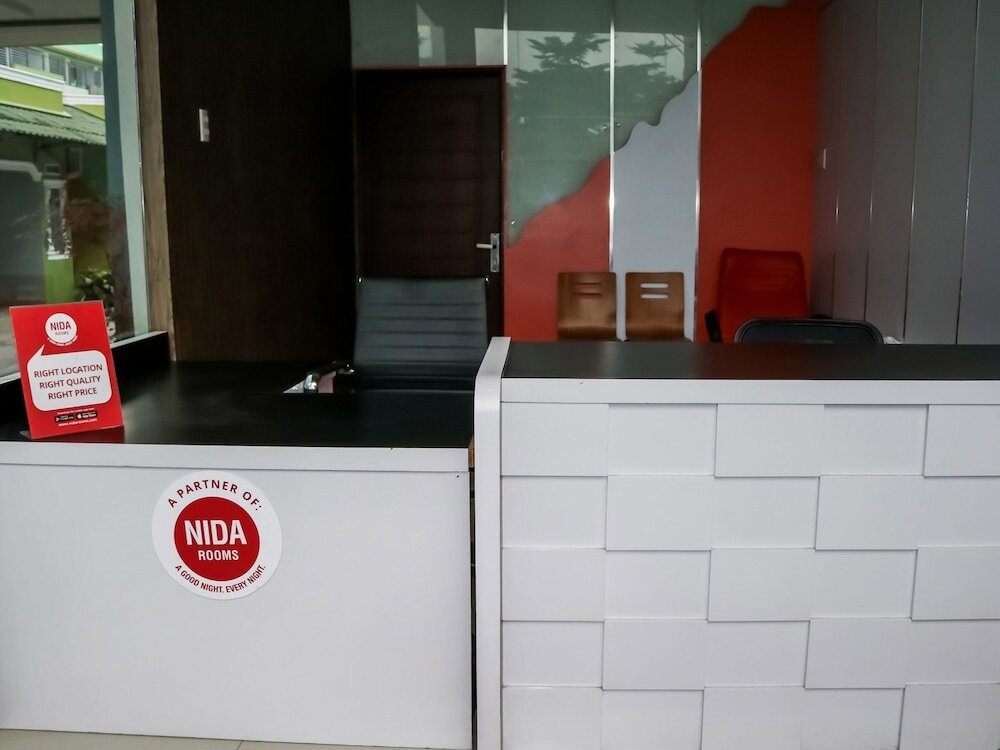 Петумбак: Nida Rooms Pasar Buah Medan Tuntungan