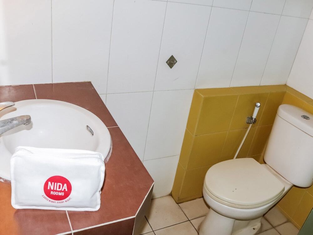 Петумбак: Nida Rooms Pasar Buah Medan Tuntungan