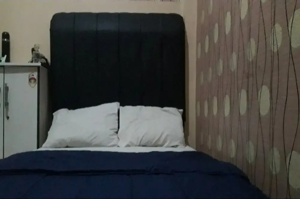Караванг: OYO 90706 Kost Alam Jaya Syariah