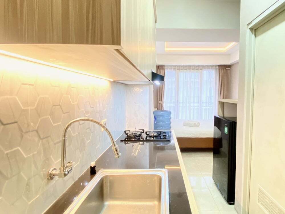 Бандунг: Homey Studio Room At Grand Asia Afrika Apartment