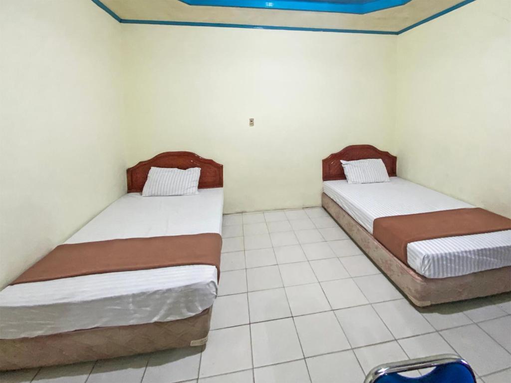 Палангкарая: Capital O 91806 Hotel Batu Suli