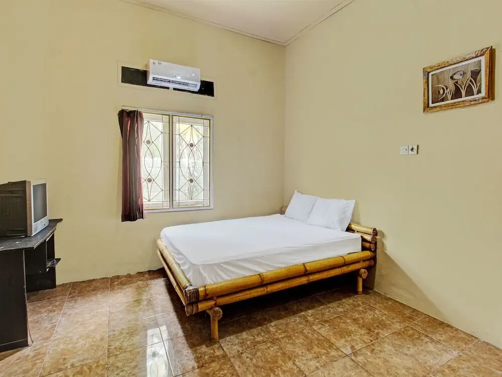 Jerowaru: OYO 92197 Zahira Homestay Near Ekas Surf School and Service