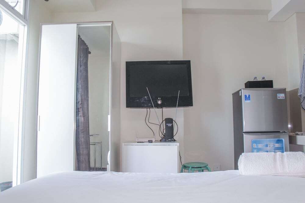 Джакарта: Homey Studio with City View Apartment @ Puri Orchard