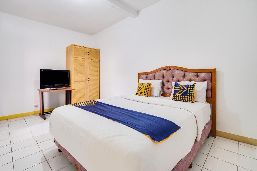 Бандунг: OYO 91546 Dewi Sudirman Homestay