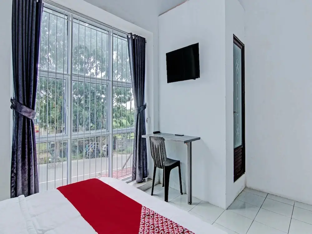 Пеканбару: OYO 92047 Penginapan Arfi Syariah
