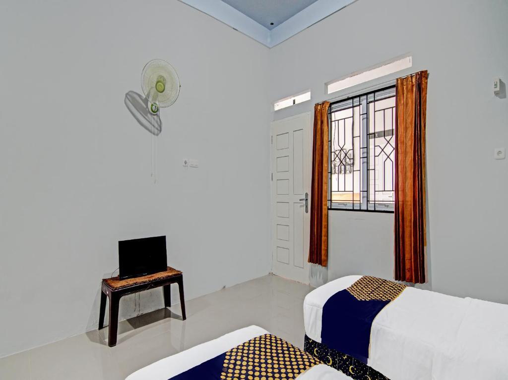 Пеканбару: OYO 91847 Rumah Singgah Kinaya Syariah