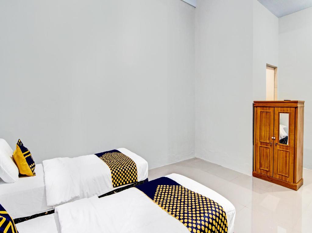 Пеканбару: OYO 91847 Rumah Singgah Kinaya Syariah