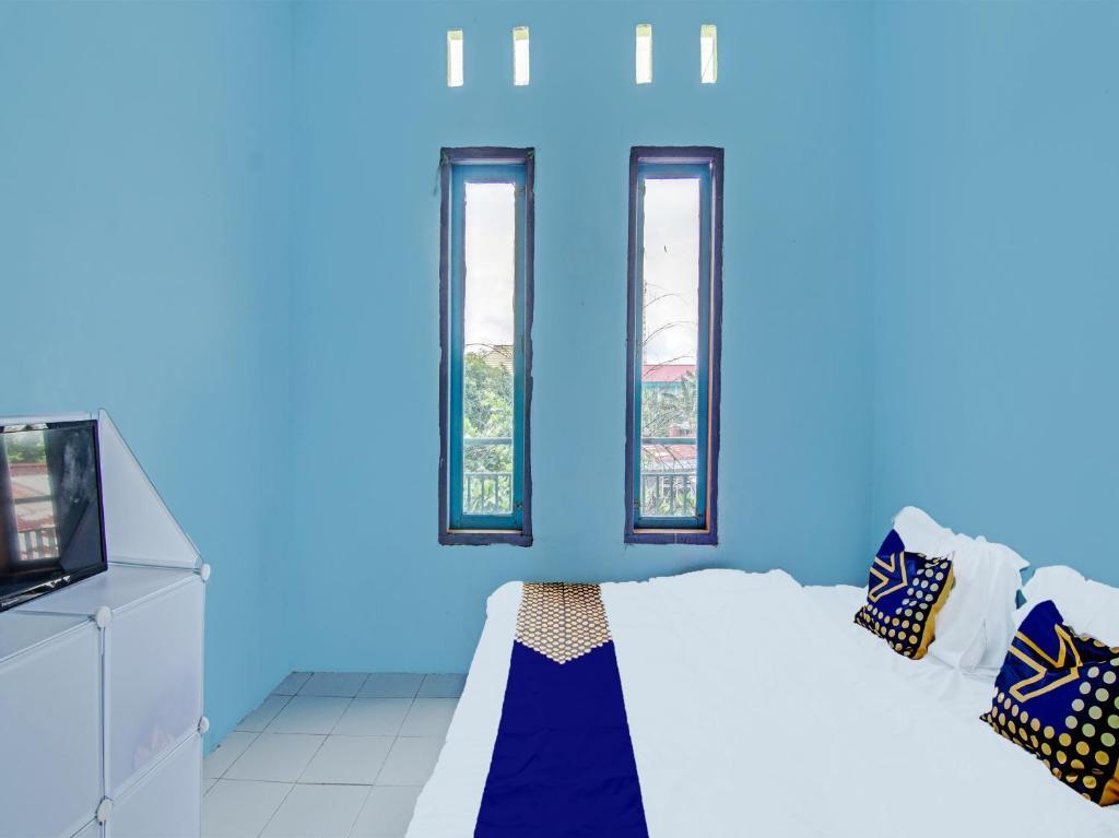 Пеканбару: SPOT ON 91918 Najla Guest House Syariah