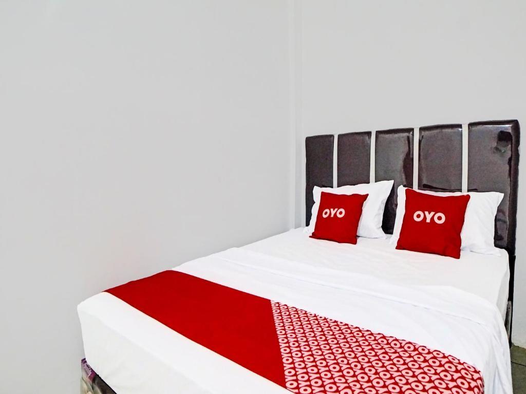 Медан: OYO 91509 Unggul Kost