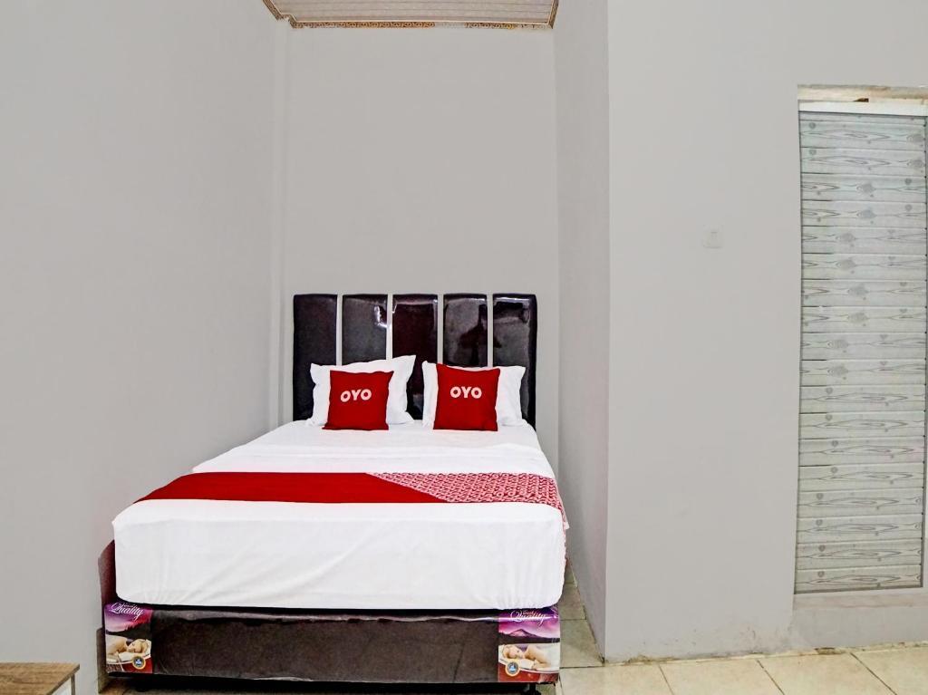 Медан: OYO 91509 Unggul Kost
