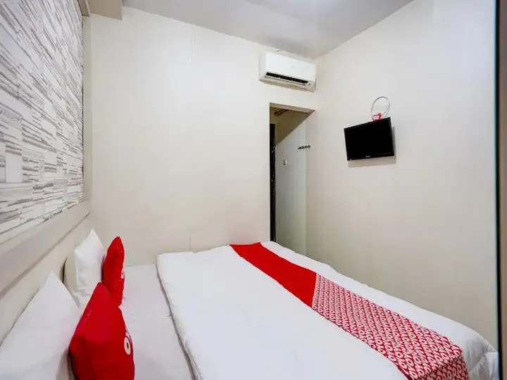 Сурабая: OYO Life 90606 Glass House Citraland Syariah