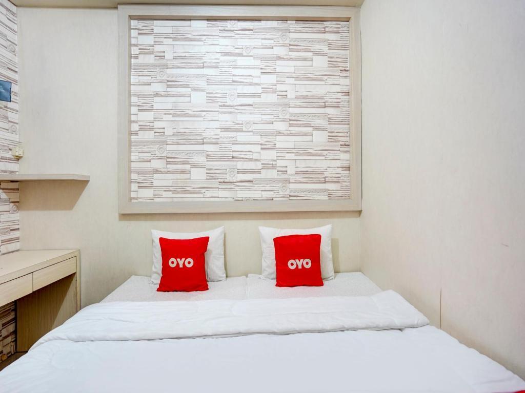 Сурабая: OYO Life 90606 Glass House Citraland Syariah