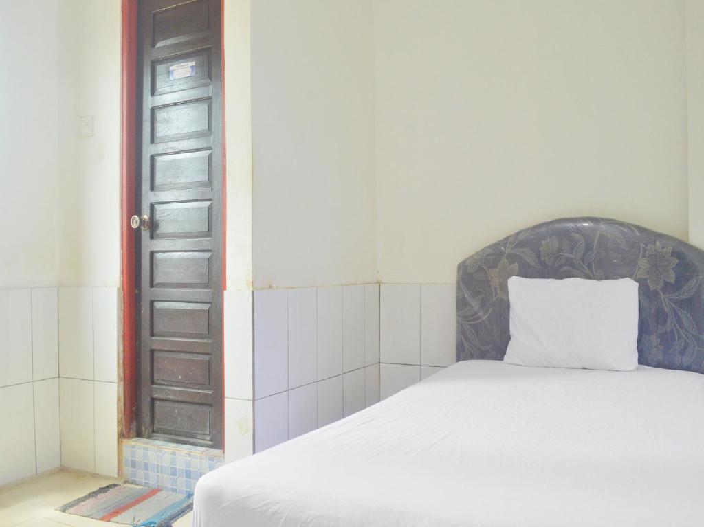 SPOT ON 91623 Pj Guest House Syariah — фото 1