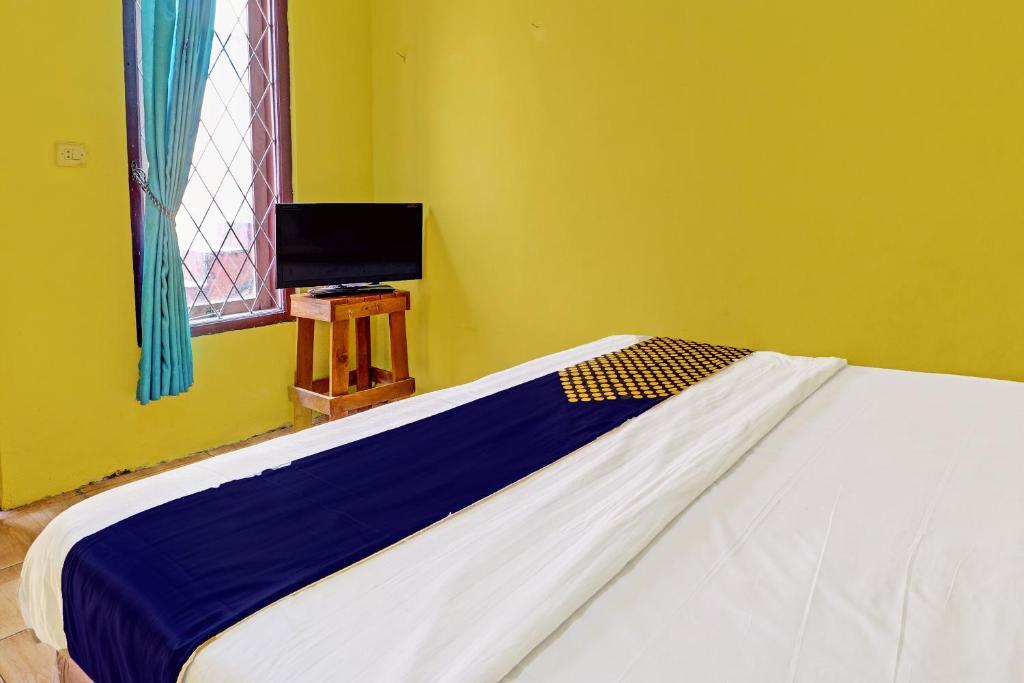 Сиамис: OYO Life 91478 Wisma Aura Syariah
