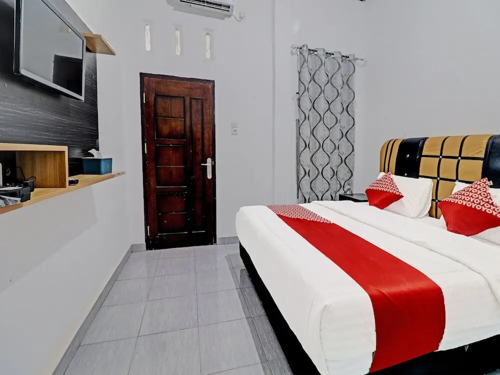 Саролангун: OYO 91203 Naufal Residence Syariah