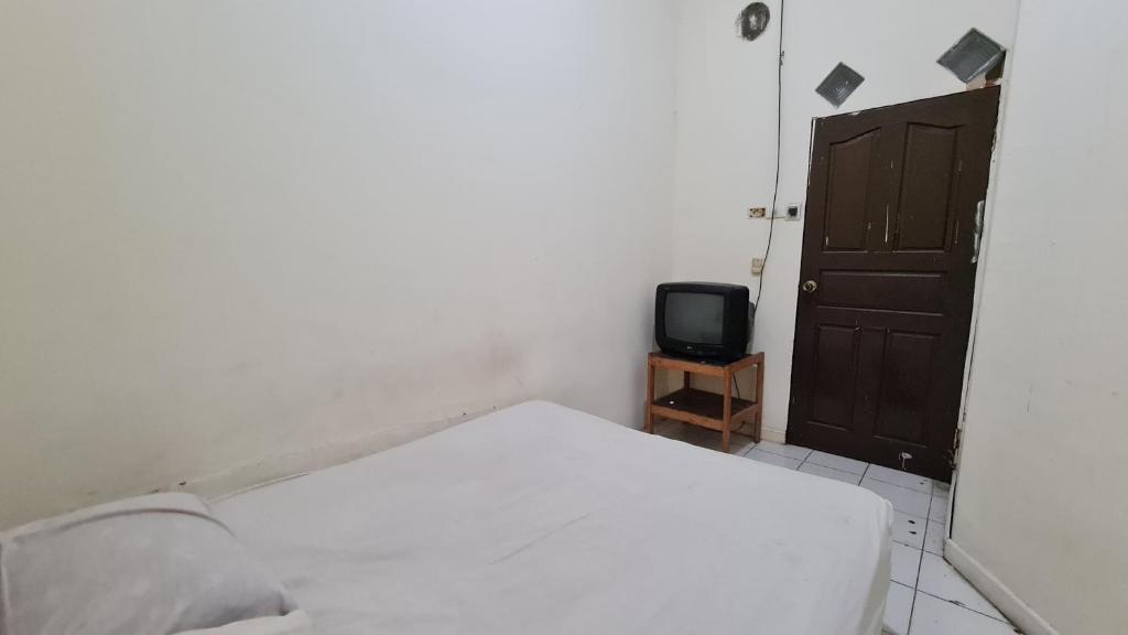 Пеканбару: Oyo 91200 Wisma Gio Amanda