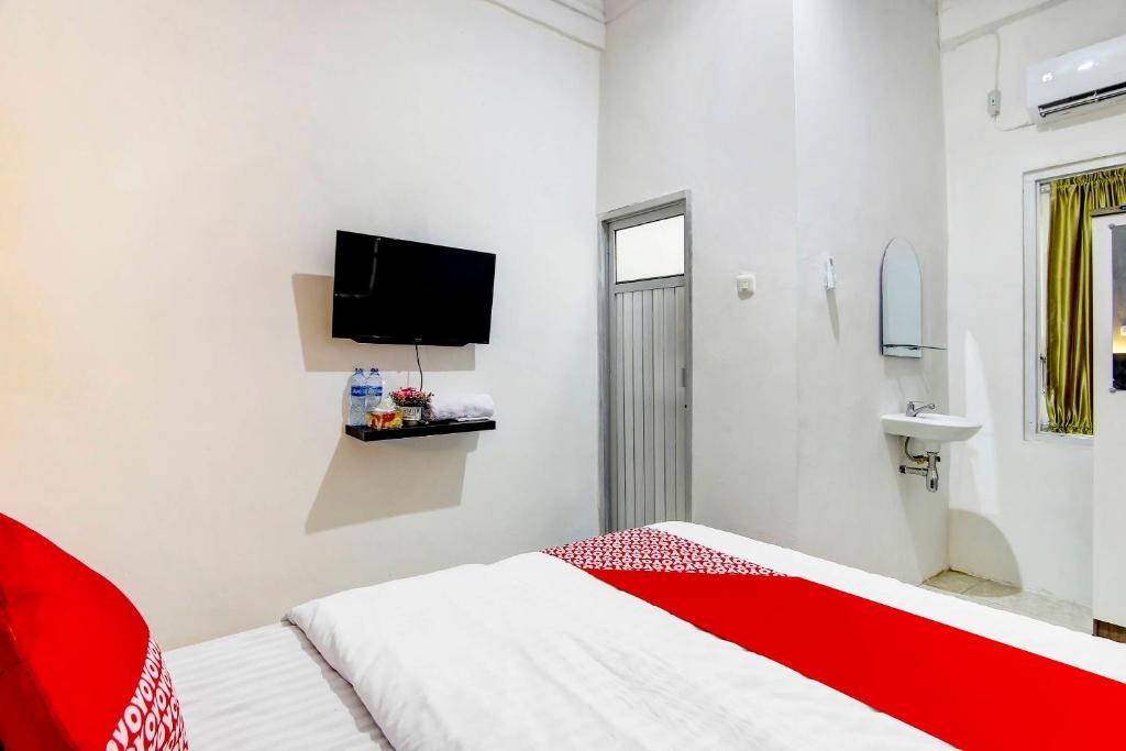 Палембанг: OYO 91026 Kasmarani Residence Syariah