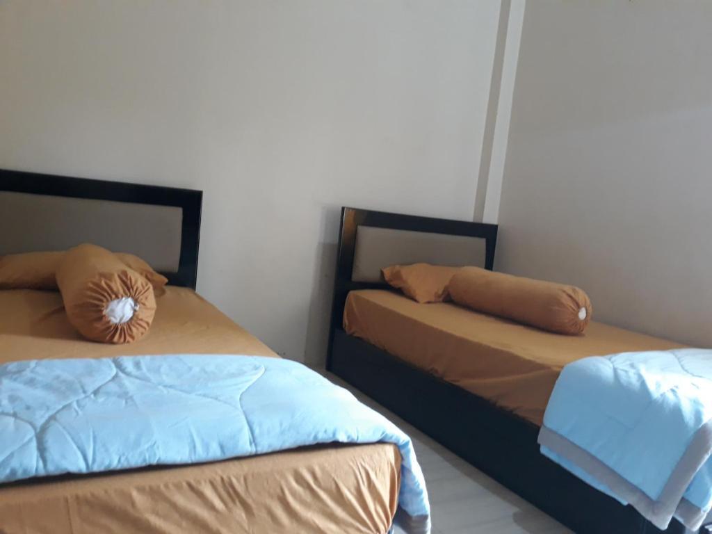 Палу: OYO 91162 Homestay Ansyariah Syariah
