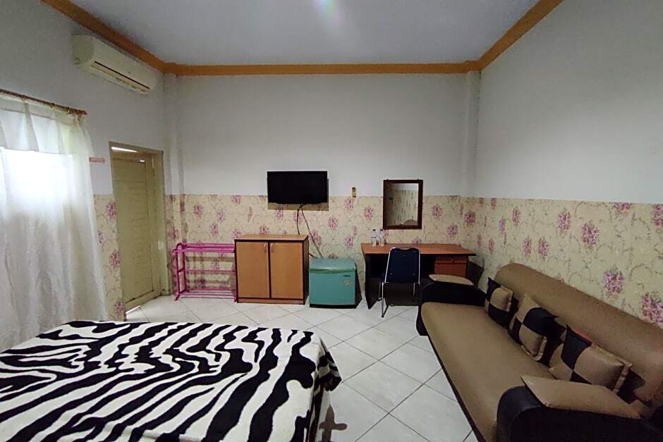 Помала: Capital O 91650 Hotel Pratama