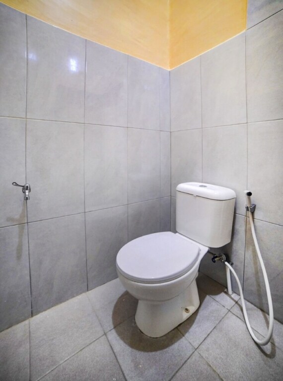 Тебингтинги: OYO 90773 Shine Guest House