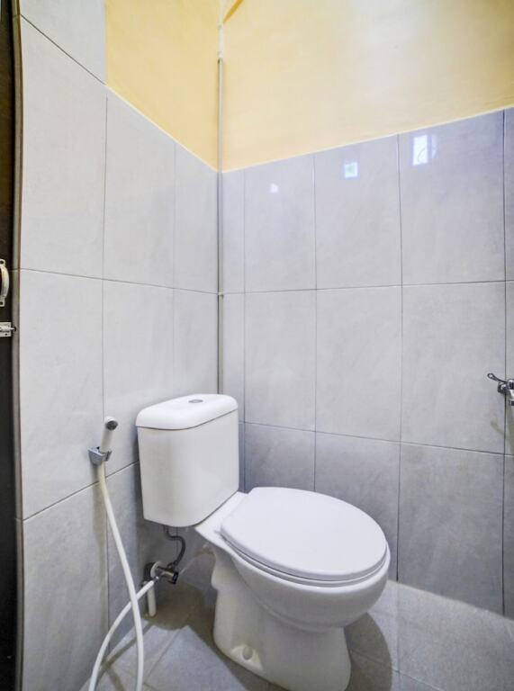 Тебингтинги: OYO 90773 Shine Guest House
