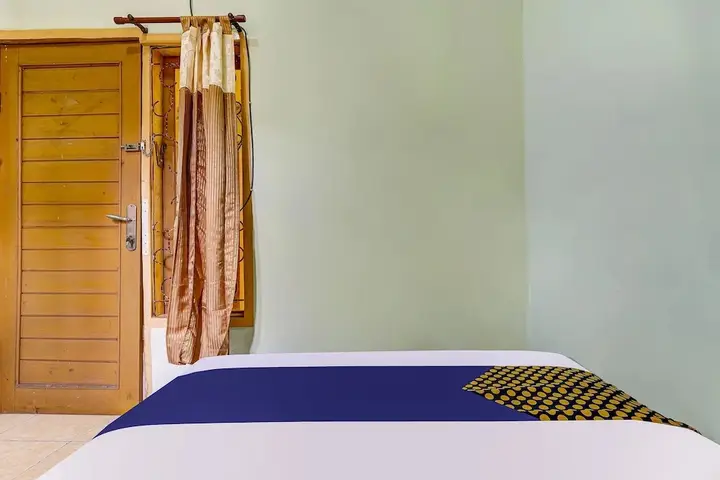 Сумеданг: SPOT ON 91159 Kost Putrana Syariah