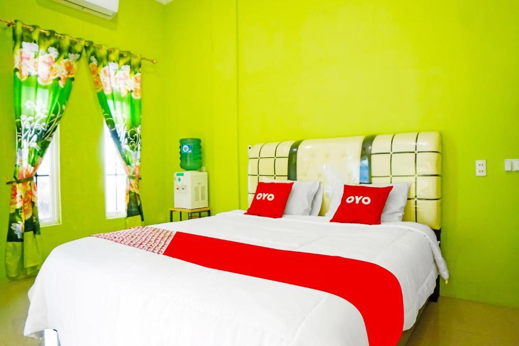 Медан: OYO 91435 Berliany Home 2
