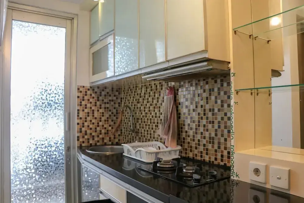 Джакарта: Warm And Minimalist 2Br Green Bay Pluit Apartment