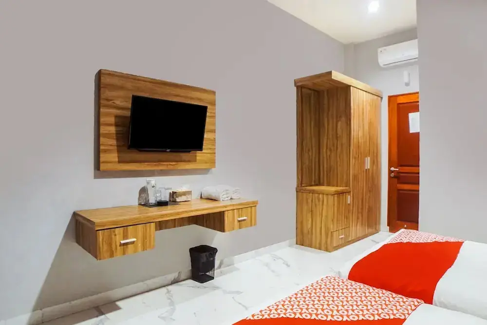 Медан: SUPER OYO Capital O 92066 Papakoel Hotel & Cafe