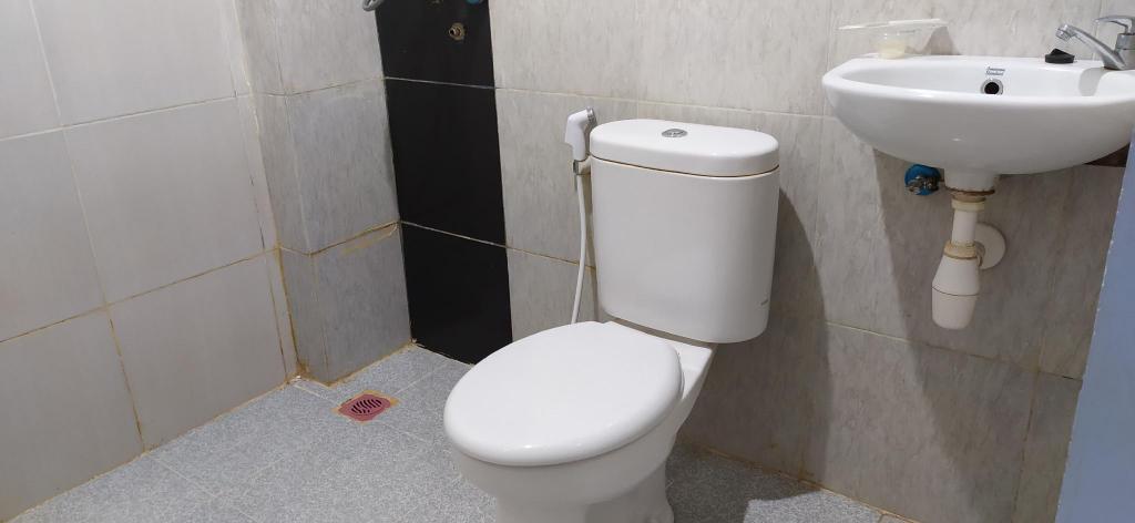 Мартапура: Super OYO 3903 Sweethome Syariah Guesthouse