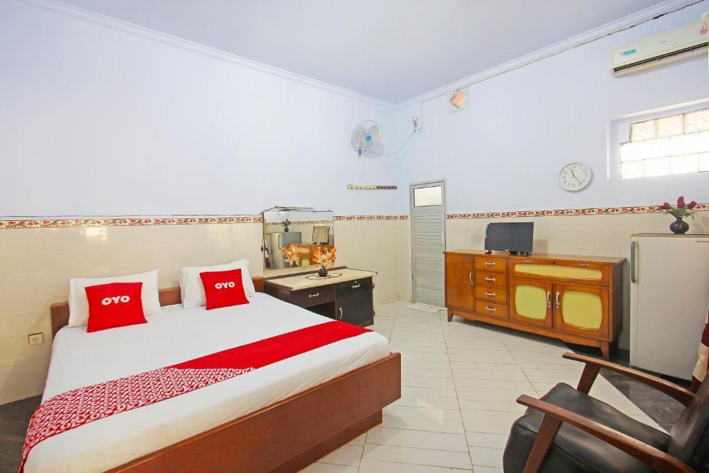 Матарам: OYO 91516 Wisata Hotel