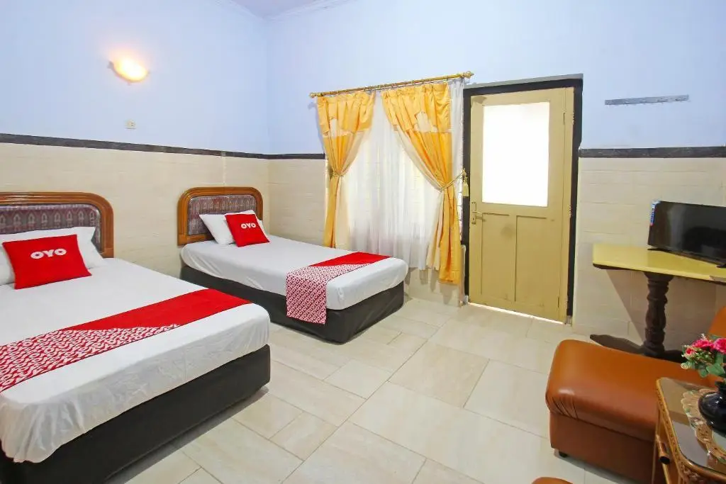 Матарам: OYO 91516 Wisata Hotel