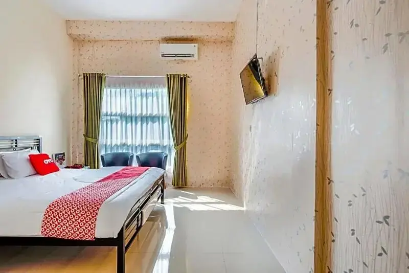 Ламонган: Penginapan Keluarga Syariah by OYO Rooms