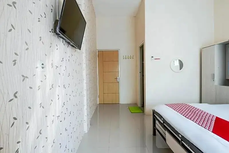Ламонган: Penginapan Keluarga Syariah by OYO Rooms