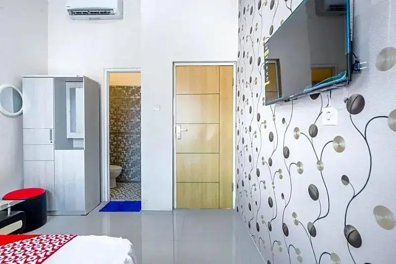 Ламонган: Penginapan Keluarga Syariah by OYO Rooms