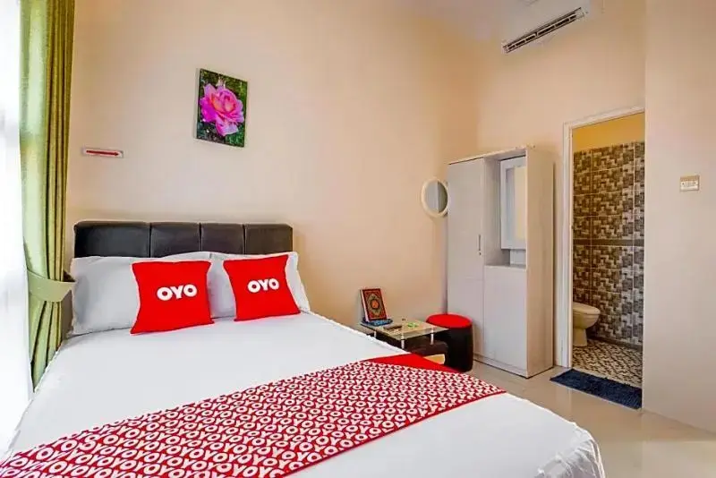 Ламонган: Penginapan Keluarga Syariah by OYO Rooms