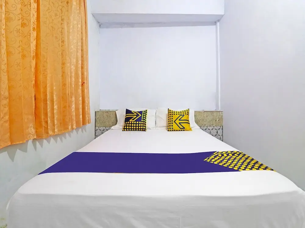 Джамби: SPOT ON 91222 Kanjeng Mami Homestay Syariah