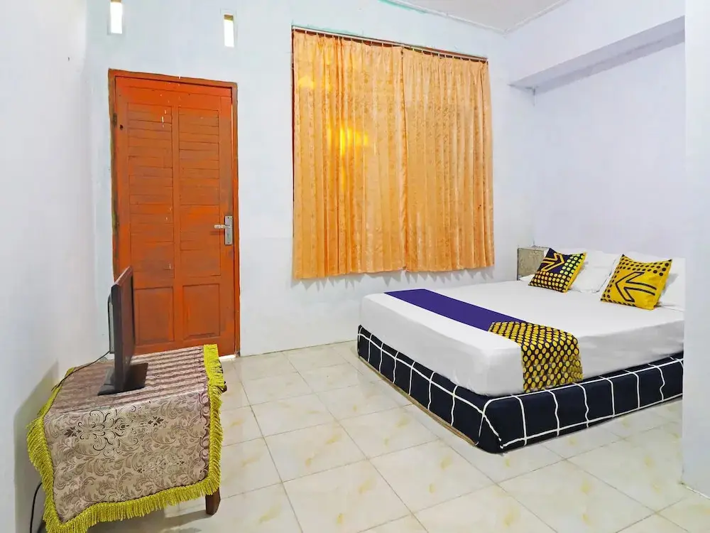 Джамби: SPOT ON 91222 Kanjeng Mami Homestay Syariah