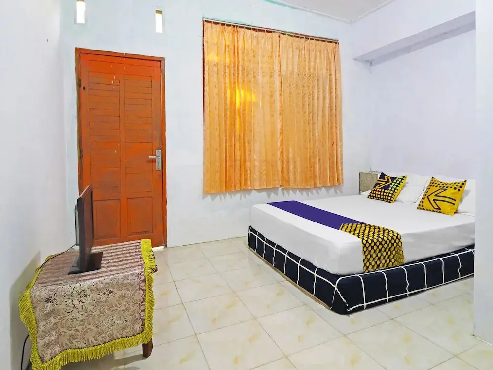 Джамби: SPOT ON 91222 Kanjeng Mami Homestay Syariah