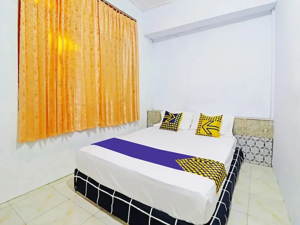 Джамби: SPOT ON 91222 Kanjeng Mami Homestay Syariah