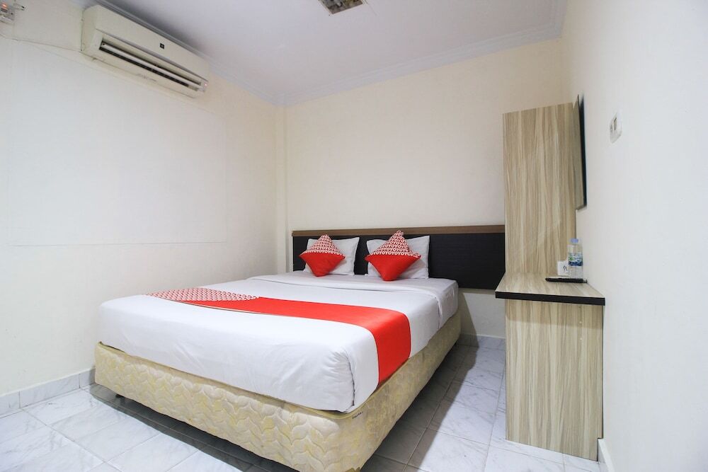 Пеканбару: Oyo 1298 Dlira Syariah Hotel
