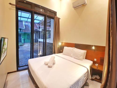 Бату: The Batu Villas Panderman Garden C5