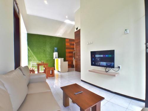 Бату: The Batu Villas Panderman Garden C5