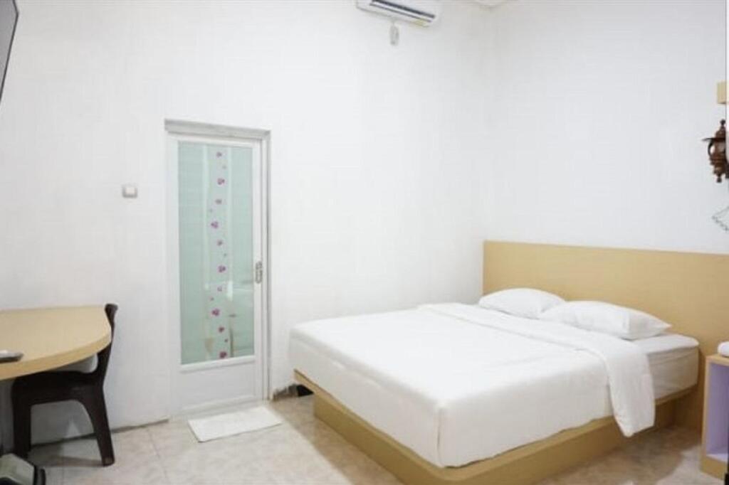 Пангкаланбун: OYO 90221 Makarim Guest House Syariah