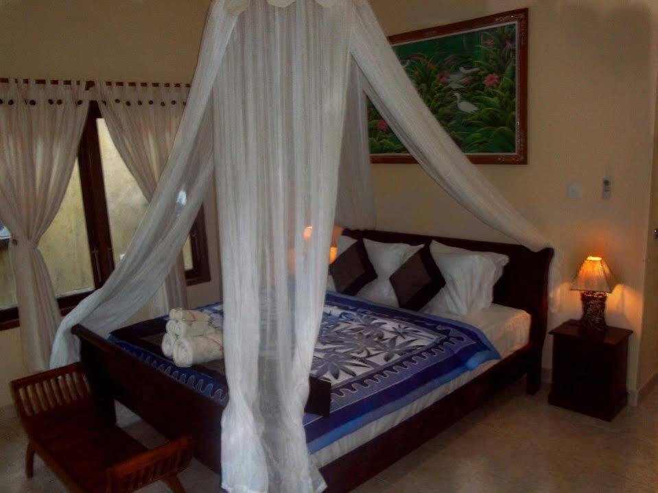 Бунутан: Bali Bhuana Beach Cottages