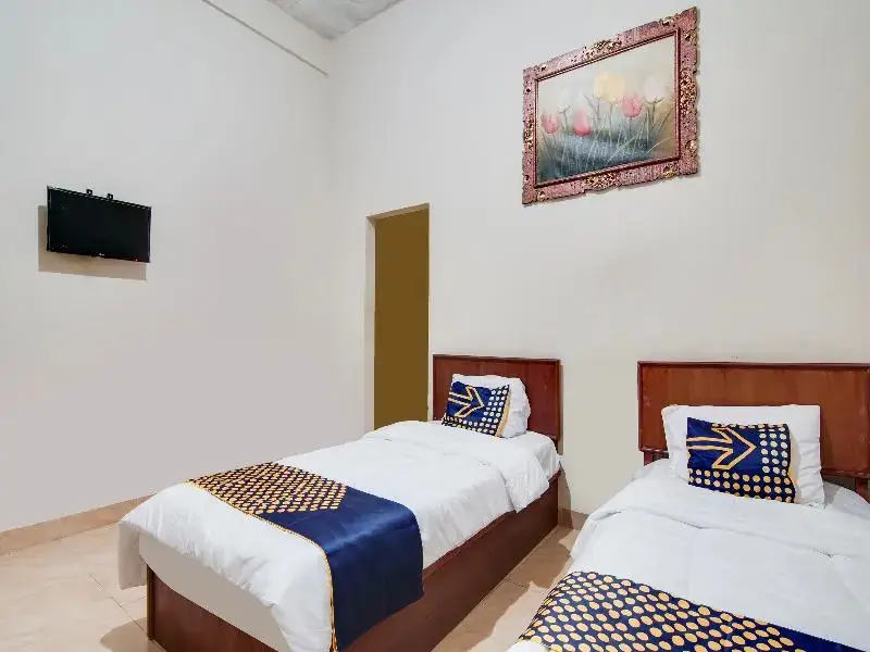 Пеканбару: Spot On 91752 Izzami Homestay Syariah