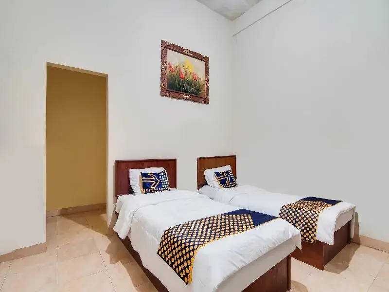 Пеканбару: Spot On 91752 Izzami Homestay Syariah