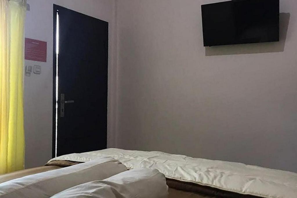 Джамби: Marthina Residence Syariah Mitra RedDoorz